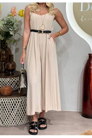 JUMPSUIT MED DEKORATIVA AXELRINGAR