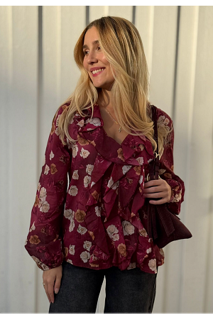 BLOMMIG V-RINGAD BLUS MED VOLANGER