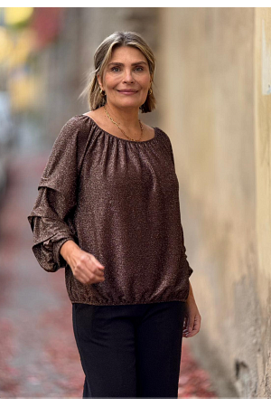 GLITTERBLUS MED VOLANGÄRM HELT UNDERBAR