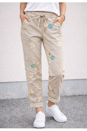 MAGISKA BYXAN MED BRODERADE BLOMMOR