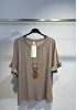 T-SHIRT MED MEDFÖLJANDE HALSBAND 7