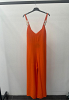 JUMPSUIT MED DEKORATIVA AXELRINGAR 3