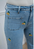 BRODERADE JEANS MED CITRUSDETALJER 3