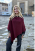 STICKAD PONCHO MED VINKLAD KANT 5